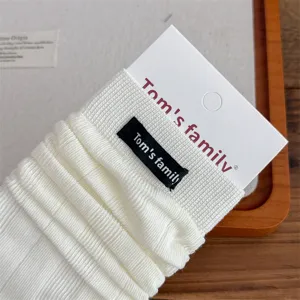 Women ballet style stirrup leg warmers white ribbed long slouch socks detail view comfortable chic.