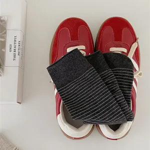 Striped cotton mid-calf socks detail close-up view, casual everyday daily hosiery style.