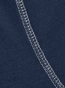 Close-up macro view showing the dark blue fabric texture and white stitching detail of the apparel.