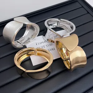 Wide open cuff bracelet set, metallic matte and glossy finish, stylish alloy wrist jewelry detail.