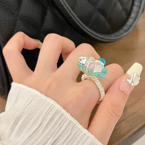 Handmade wire-wrapped crystal ring with natural stone and colorful beads for women detail.