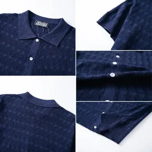 Detailed view of navy blue men's knitted polo shirt with elegant jacquard texture