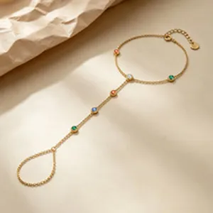 Exquisite gold finger bracelet featuring multi-color zircon accents and adjustable chain link