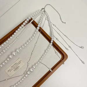 Mehrschichtige Perlen Quaste Taillenkette, zarte Körperkette für Damen und Mädchen.