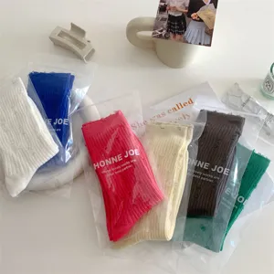 Women cotton distressed slouch socks in multi colors, comfortable casual knit socks detail.