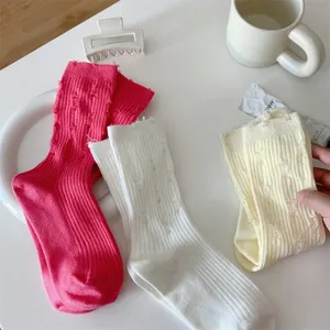 Comfortable cotton distressed slouch socks for women, trendy solid color casual mid-tube socks.
