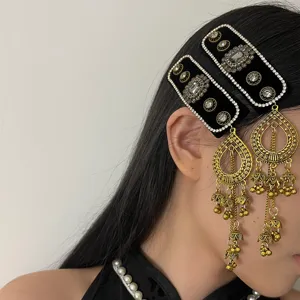 Neuartiger chinesischer ethnischer Haarglieder mit Strasssteinen und goldenen Quasten.