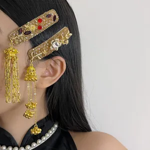 Exquisite gold-toned rhinestone hair clips with tassel chains, elegant side hair accessories.