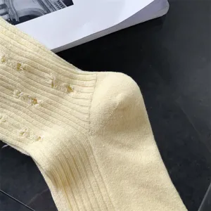 Women's autumn winter distressed socks solid color cotton slouch socks detail display