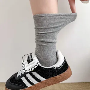 Comode calze grige da donna, calze lunghe in cotone traspirante, calze casual a sbuffo.