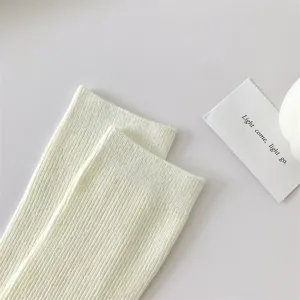 Solid color ribbed cotton mid-tube women socks, comfortable daily wear, simple minimalist style.