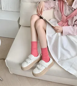 Pink ribbed mid-calf socks detail shot, sweet candy color cotton daily wear socks.
