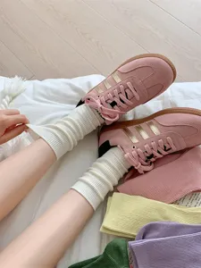 Comfortable solid color cotton mid-tube women socks detailed view, soft and breathable fabric.