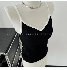 Black contrast trim ribbed camisole top with built-in chest pad, French style pearl fibre sling.