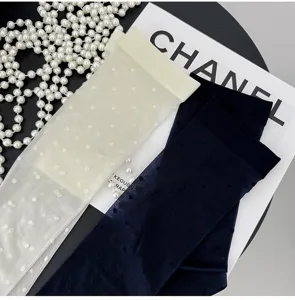 Chaussettes transparentes à pois pour femmes, bas d'été respirants, style élégant.