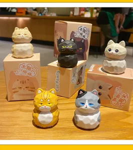 Cute resin cat figurines with wooden carving style, creative desktop decor ornaments.