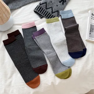 Autumn colorful striped mid-tube cotton socks for women, Japanese style casual everyday wear detail.