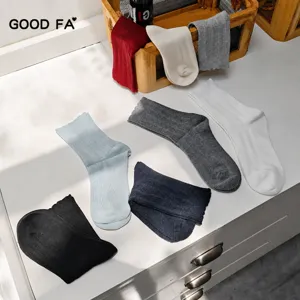 Women solid color mid-tube cotton socks with crochet lace design for autumn and winter daily wear.