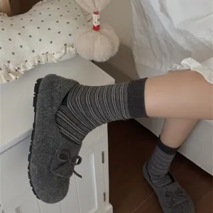 Comfortable striped mid-calf women socks with cozy casual shoes for daily autumn wear style.