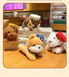 Cute plush puppy keychain detail, adorable stuffed animal doll pendant with mini hat and glasses.