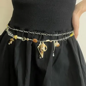 Chic chaîne de taille double couche avec coquillage et perles pour femmes tendance chic.