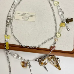 Chic chaine de taille double couche avec pendentifs coquillage et perles pour l'ete.