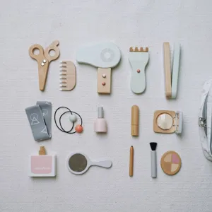 Wooden kids makeup and hair salon toy set detail showing accessories like comb and perfume.