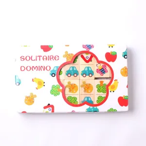 Wooden domino puzzle toy set detail shot showing cute cartoon blocks inside gift box.
