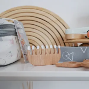 Wooden hair comb and pretend play toy set detail, exquisite craftsmanship and natural wood texture.