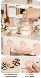 Wooden pretend play kitchen toy details, coffee machine stove knobs and cookware set.