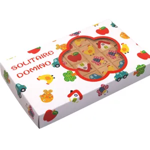 Wooden dominoes game detail showing colorful printed animal and fruit tiles inside box.