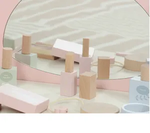 Close-up shot of wooden pretend play makeup toy accessories, safe and durable for kids.