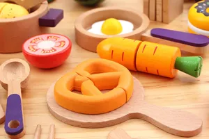 Wooden kitchen pretend play toy set detail, cutting food toys for kids safe design.