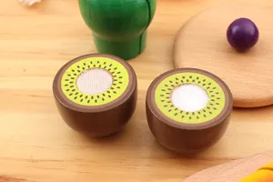 Wooden kiwi fruit toy cutting detail close up display, ideal for kids kitchen pretend play food sets.