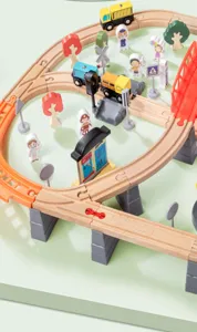 Wooden electric magnetic train track set detailed view showing colorful tracks and figures.