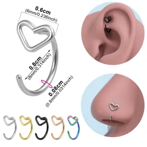 Detailaufnahme von Edelstahl Herz Piercing Schmuck mit Größenangaben und Tragemöglichkeiten.