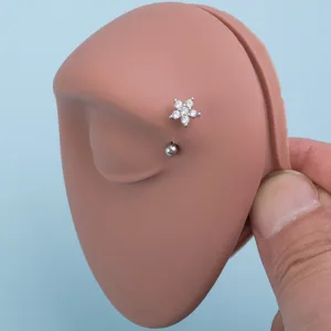 Rostfreier Edelstahl Piercing Schmuck mit glänzenden weißen Zirkon Blumen Oberteilen.