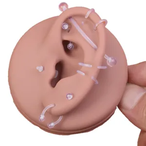Acryl transparent Körper-Piercing Schmuck Set mit Silikon Ohr Modell für Display Training.