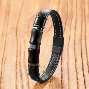 Vintage black leather bracelet with bamboo-shaped stone beads and magnetic steel clasp.