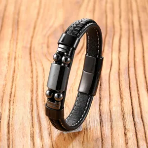 Close-up of black braided leather men bracelet with stainless steel magnetic clasp.