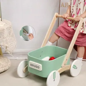 Wooden toddler baby walker with storage basket and adjustable speed wheels for early learning.