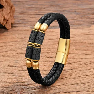 Bracelet tressé en cuir noir avec fermoir aimanté en acier inoxydable doré et pierres de lave.