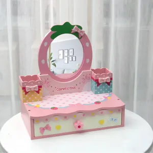 Wooden pretend play makeup vanity toy detail, pink dressing table with mirror and drawer.