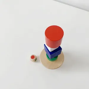 Wooden balancing stacking toy game set with colorful blocks and dice for kids.