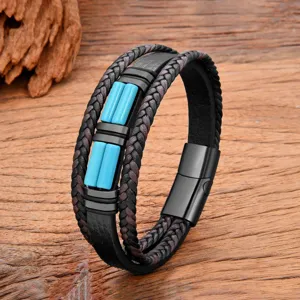 Close-up detail of mens multi-layer leather braided bracelet with blue accents and clasp.