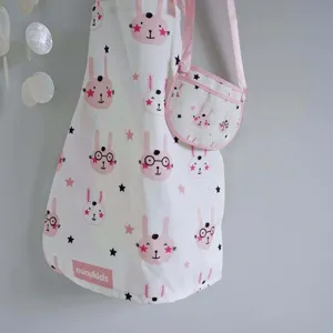 Enfants mignon lapin imprimer blanc tissu tablier et petit sac ensemble pour jeux de rôle.