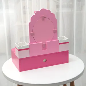 Wooden kids pretend play vanity table toy detail view, pink makeup desk with drawer and mirror.