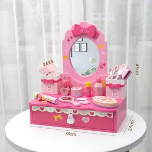 Wooden kids pretend play vanity dressing table with makeup accessories and drawer storage.