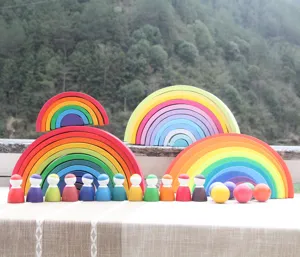 Wooden rainbow stacking toy set with arch blocks, peg dolls and balls for kids early education.