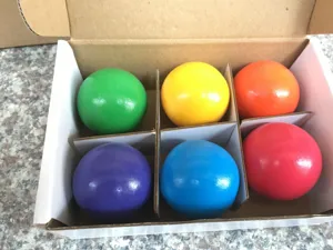 Wooden rainbow balls set early education toy colorful wooden spheres in storage box for kids.